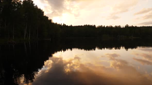 beautiful sunset reflecting on a lake in finland