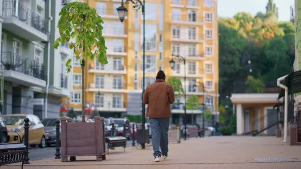 Casual Man Walking City Modern Residential Area Rear View