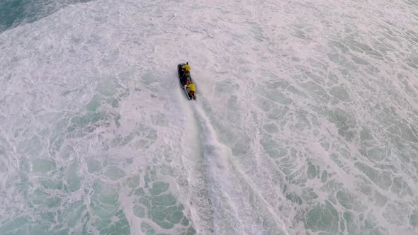 Aerial view of lifeguard surf rescue jet ski personal watercraft in Hawaii