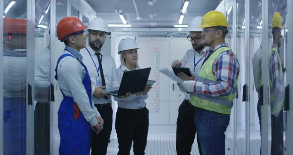 Electrical Workers Meeting in the Control Room