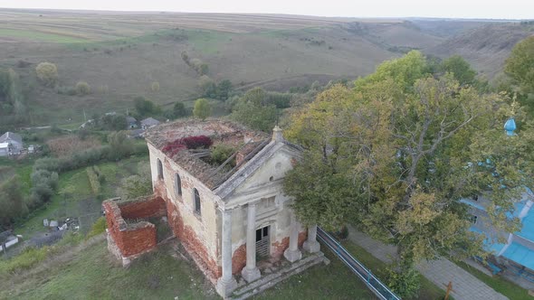 Aerial view of an abandoned building on a hill