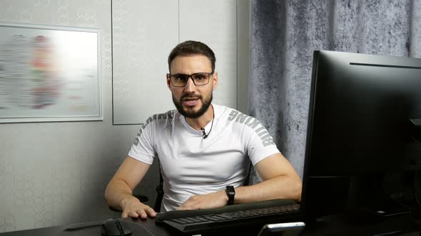 Businessman Talking to Camera Making Video Chat for Remote Job Interview