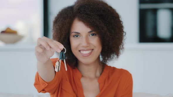 African American Happy Woman Holding Key Buying Own Home Real Estate