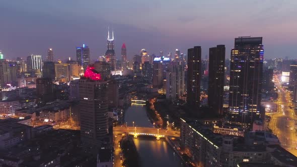 Shanghai City at Night. Huangpu Cityscape. China. Aerial Shot