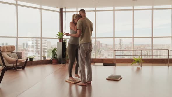 Woman Standing On Nails At Yoga Class