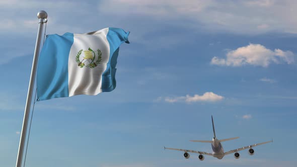Airliner Passing Above National Flag of Guatemala alt