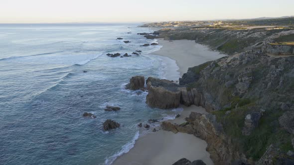 Praia do Malhao beach view at sunrise, in Portugal