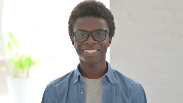 Portrait of Young African Man Smiling at Camera