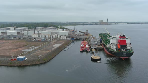 Crude Oil Tanker is Uploading in the Port Terminal