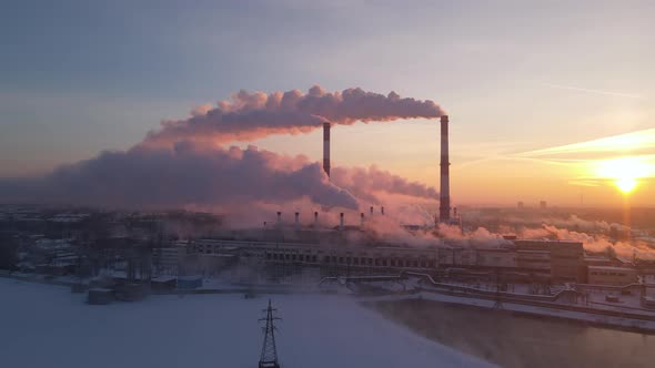 Smoking factory chimneys. Environmental problem of pollution of environment