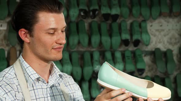 Handsome Male Shoemaker Smiling To the Camera at His Workshop 1080p