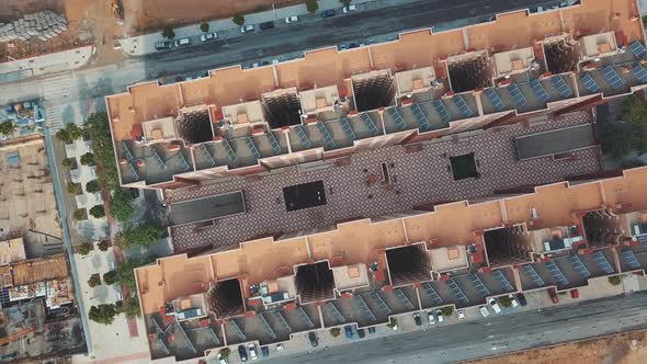 Cinematic overhead view of new buildings.