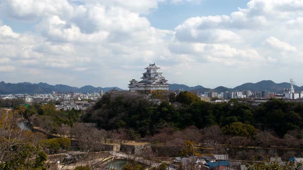 Japanese Himeji Castle on Hill By City Timelapse