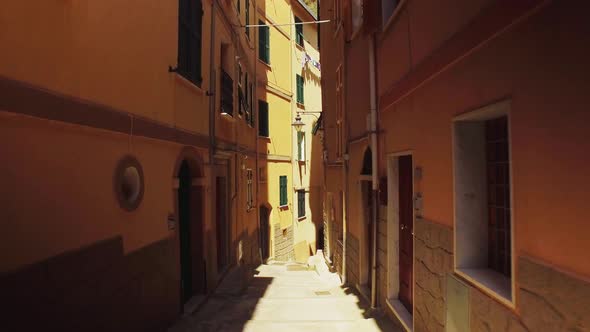 Walking Through an Ancient Narrow Street with Stone Road in Cinque Terre