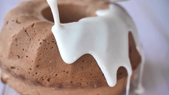 Traditional Homemade Marble Cake, Cream Pouring on Bundt Cake 