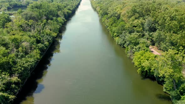 aerial drone panning footage of shipping canal.