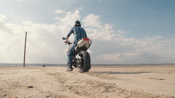 Motorcyclist Doing Tire Burnout in the Desert Slow Motion