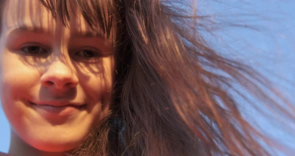 Girl with Long Hair Outdoors