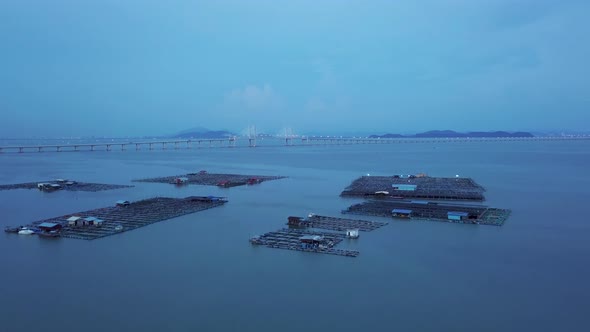 Aerial view fish farm in dusk hour