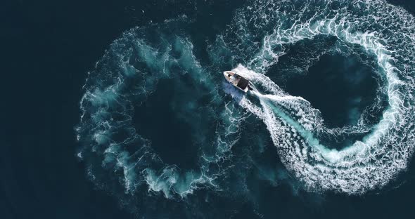 Aerial Top View of a White Pleasure Boat on a Summer Day