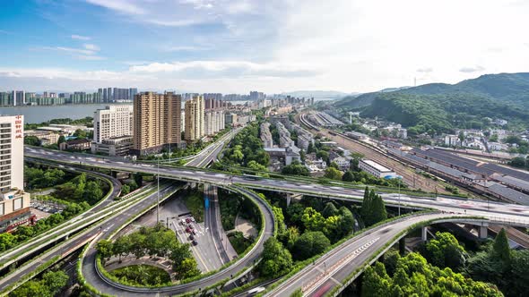 Timelapse of busy traffic road with modern office building in hangzhou china