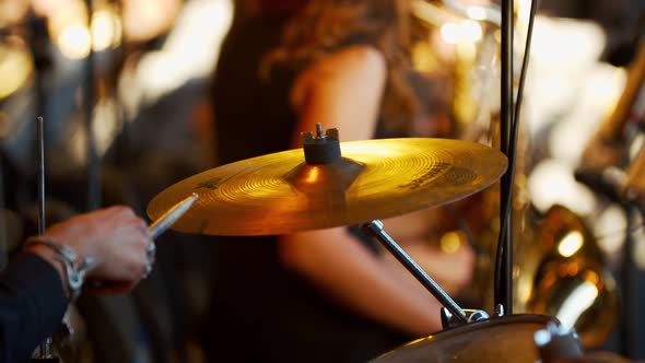 Close Up of a Ride Cymbal on the Drum Set, Drummer Is Playing, 