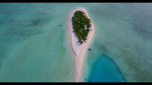 Aerial top view scenery of perfect shore beach adventure by transparent ocean with white sand backgr