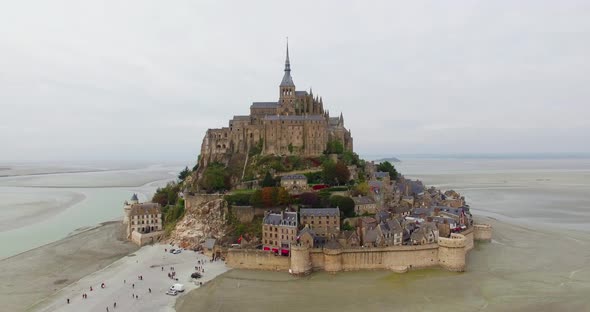 French Castle on a small island in France Le Mont Saint Michel Drone Shot 360 In Normandy Typical Go