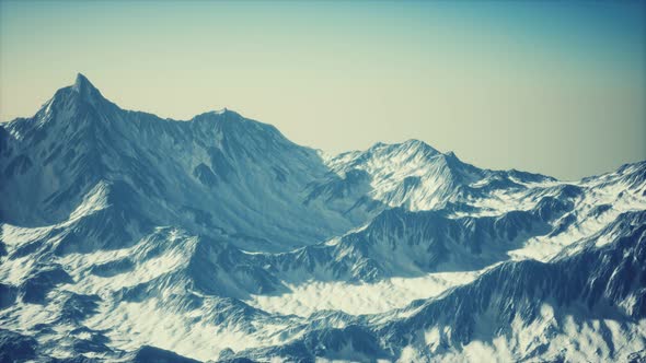 Aerial View of the Alps Mountains in Snow