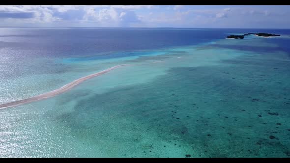 Aerial view sky of luxury bay beach voyage by blue lagoon and white sandy background of a dayout nea