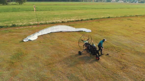 Aerial View of Paragliding Tandem Preparing To Take Off
