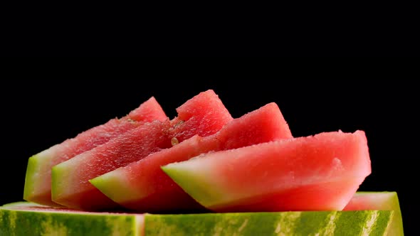 Juicy Natural Watermelon On A Black Background, Sliced Red Watermelon