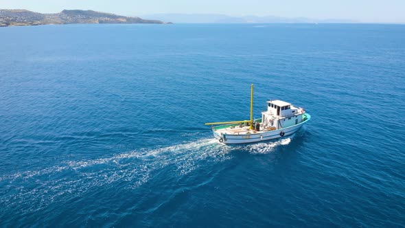 A Small Fishing Boat Goes To the Open Sea To Search for and Catch Salmon.