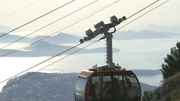 View Of Old City Dubrovnik Cable Car Passing By Sunset