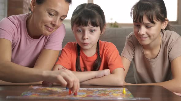 Family time with board game. 