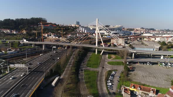 Aerial View of Busy Bypass and Ring Road at City Entrance. Cars and Buses Going Into Traffic