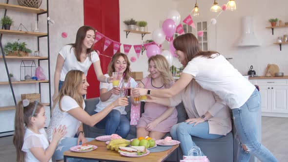 Women Toasting at Baby Shower Party