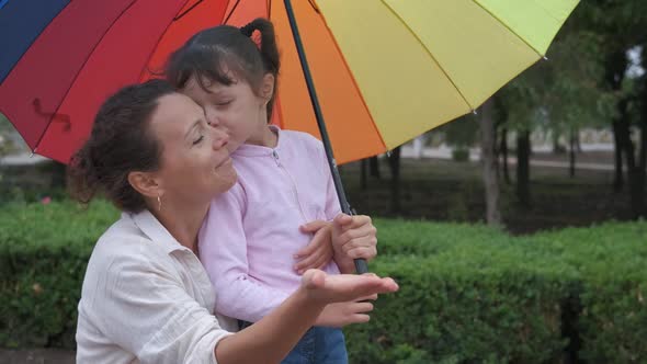 Family Under Rain Drops.