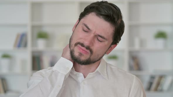 Tired Man Having Neck Pain