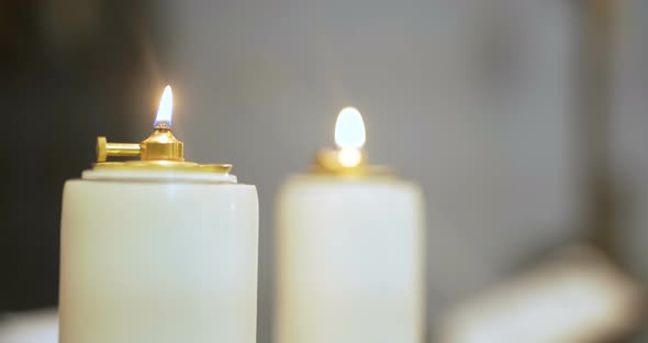 Few Lit Candles In Church