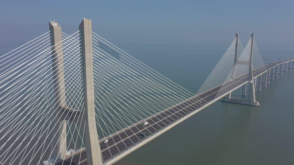 Lisbon Portugal Aerial View of the Vasco Da Gama Bridge on a Foggy Beautiful Morning During Car