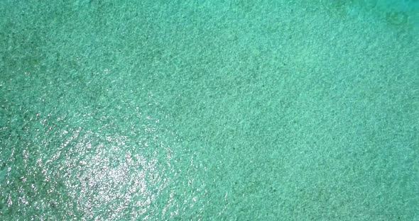 Aerial drone view of a scenic tropical island in the Maldives