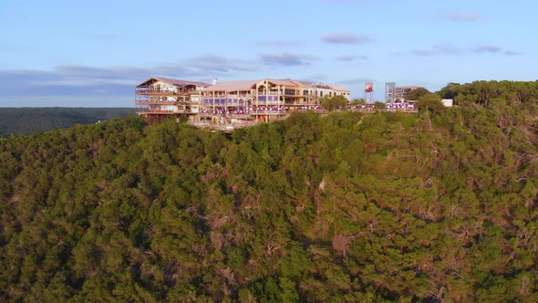 High Rising shot of the oasis on lake travis in Austin Texas. Shot on 9/10/20 during golden hour.