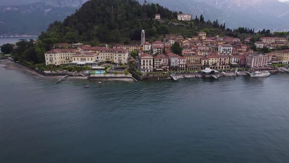 Elegant architecture of Bellagio on Lake Como, Italy; aerial push-in