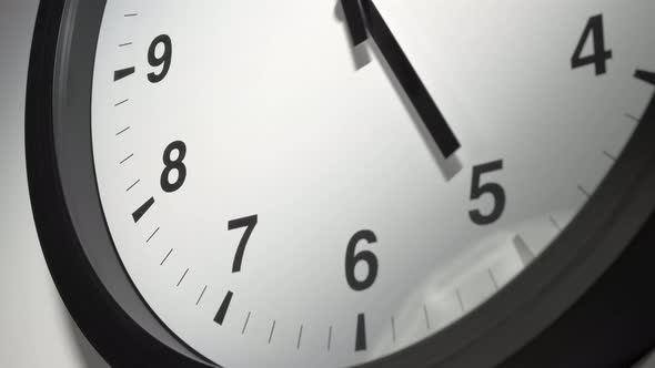 Clock Face In Time Lapse On White Wall 