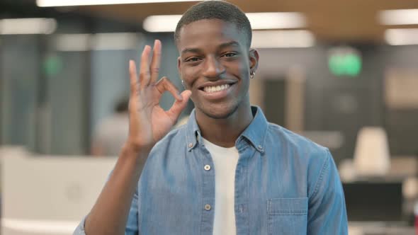 Positive Young African American Man Showing OK Sign