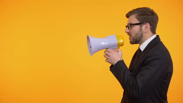 Businessman Yelling in Megaphone, Announcement of Breaking News, Place for Text