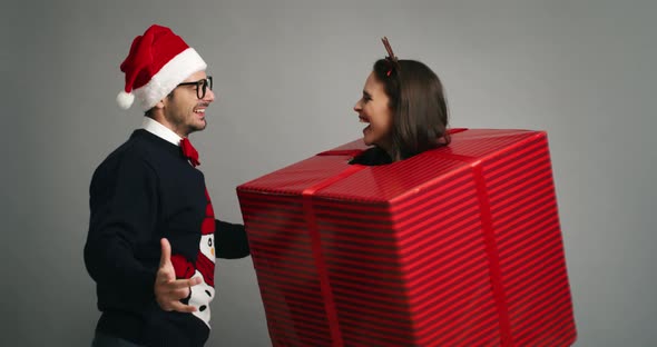 Couple of nerds dancing in Christmas time