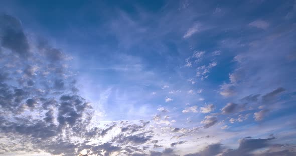 Algae clouds at sunset, blue sky