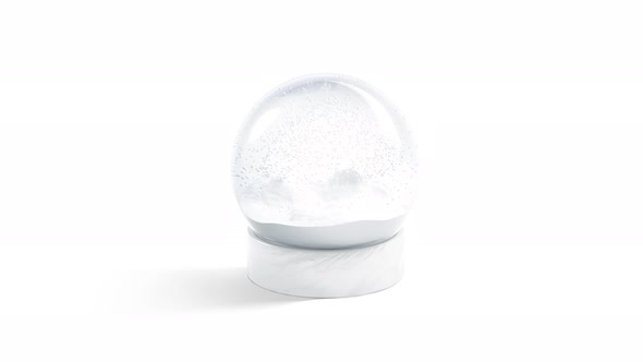 Blank glass snowglobe with snowfall, looped motion 4k